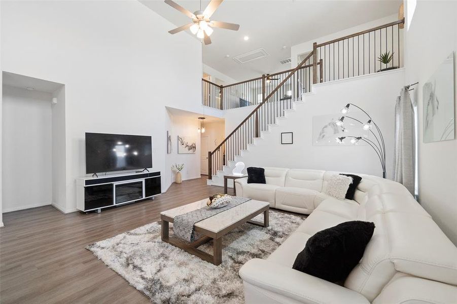 A view of the entry way on the lower left.  Above is the upstairs gameroom and secondary bedrooms.  Another peak of all of that upgraded lighting throughout the home.