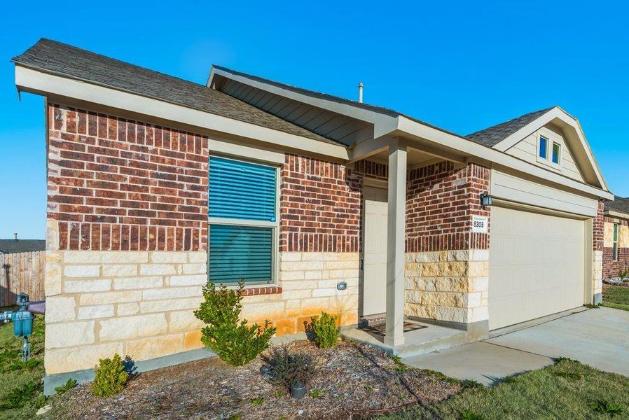 Single story home featuring a garage