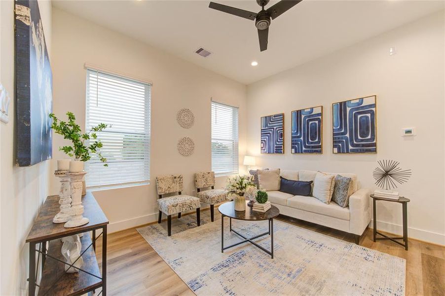 Upstairs bonus room can be used as a secondary living room (as staged), as a home office, or game room.