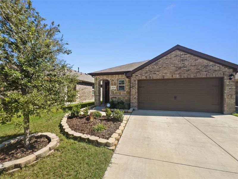 Single story home with a garage