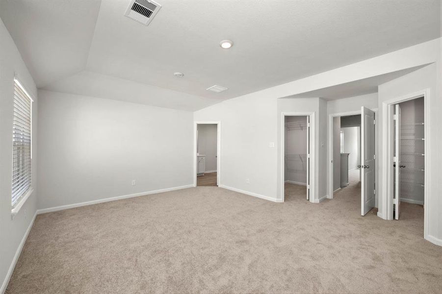 Large, primary bedroom with two walk-in closets!