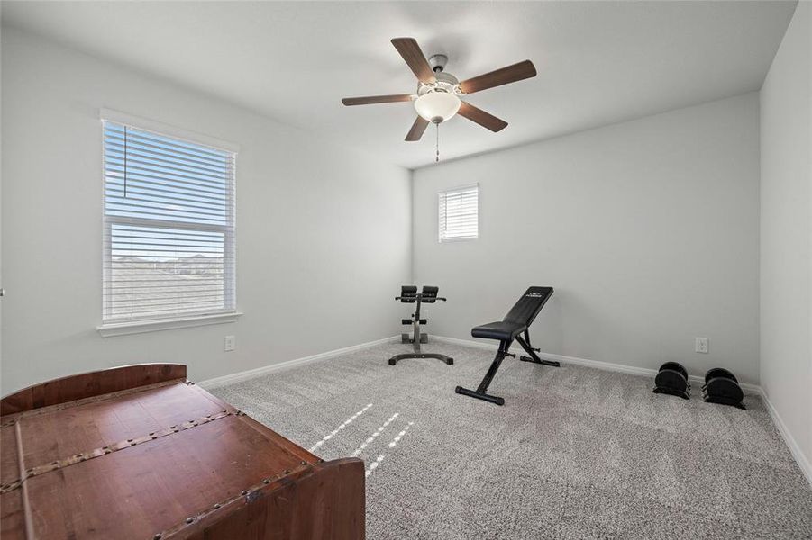 Large Secondary Bedroom Upstairs with Ceiling Fan.