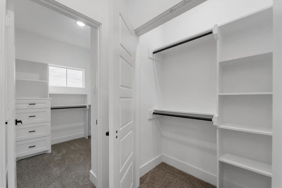 Not one, but TWO custom closets in the primary suite. No more fighting over closet space!