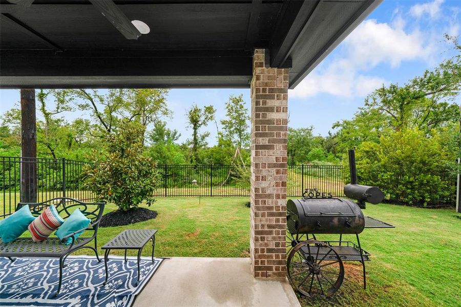 This backyard is so great and a rare find! So much mature greenery and privacy all while being in Towne Lake!