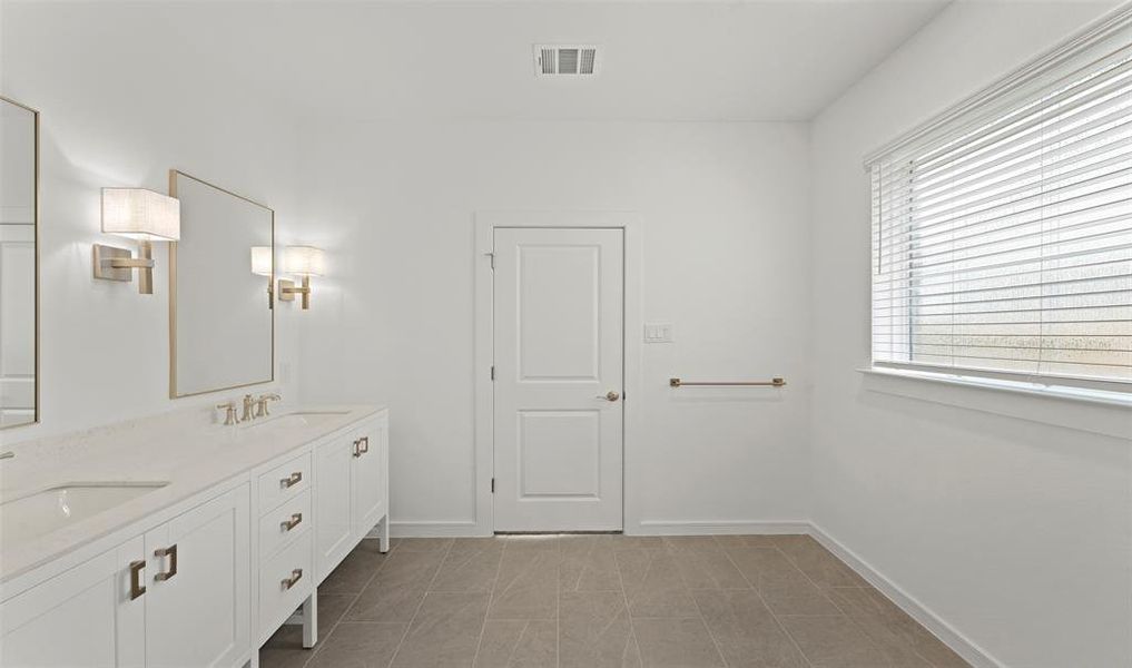 Double sinks in primary bath (please note this look is our classic pallet 1 look and this home will be built in our loft pallet 1 look please see more photos to view what our loft pallet 1 will look like *Photo not of actual home and used for illustration purposes only)