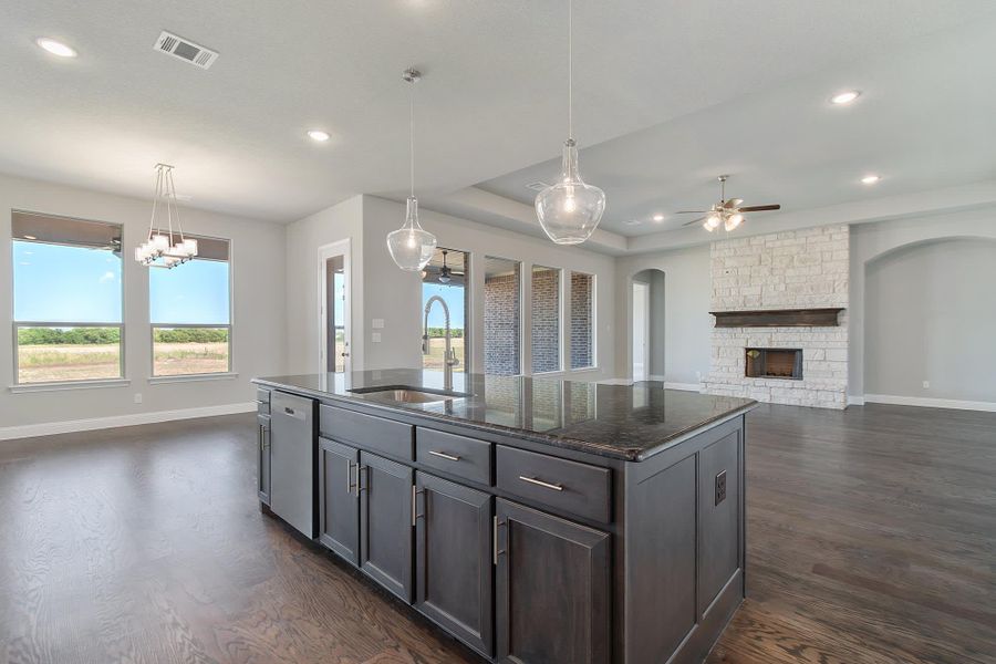 Kitchen to Family Room | Concept 3634 at The Meadows in Gunter, TX by Landsea Homes