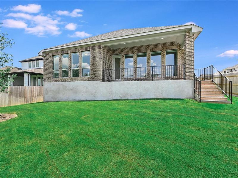 You'll love the expansive back patio.  Perfect for relaxing or entertaining.