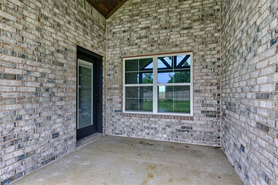 Doorway to property with a patio