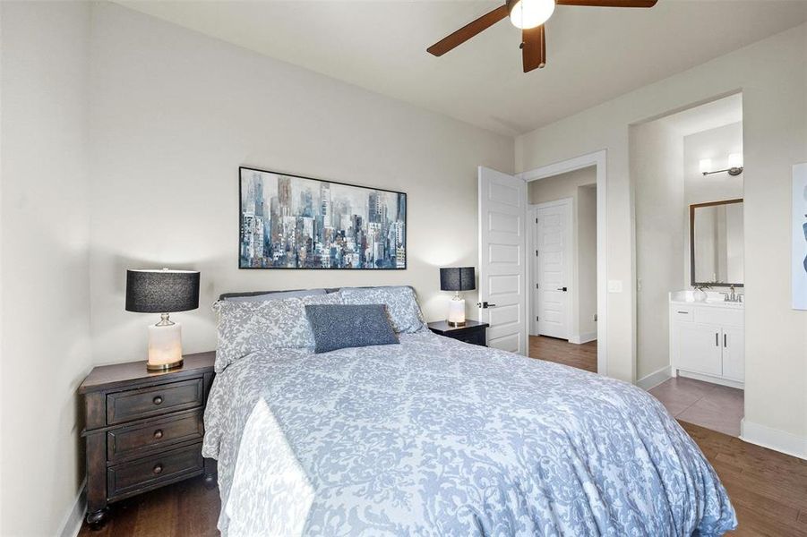 Guest bedroom 1 with opening to Jack and Jill bathroom.