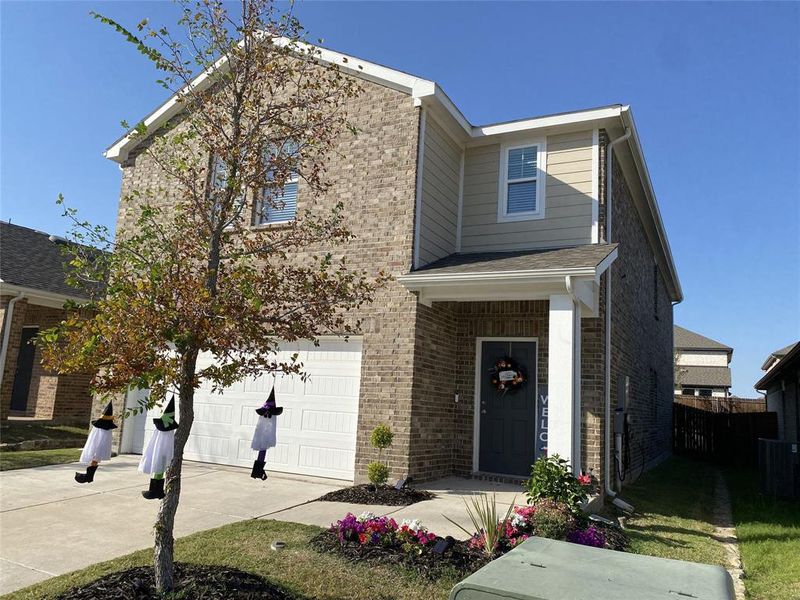 View of front of home with a garage