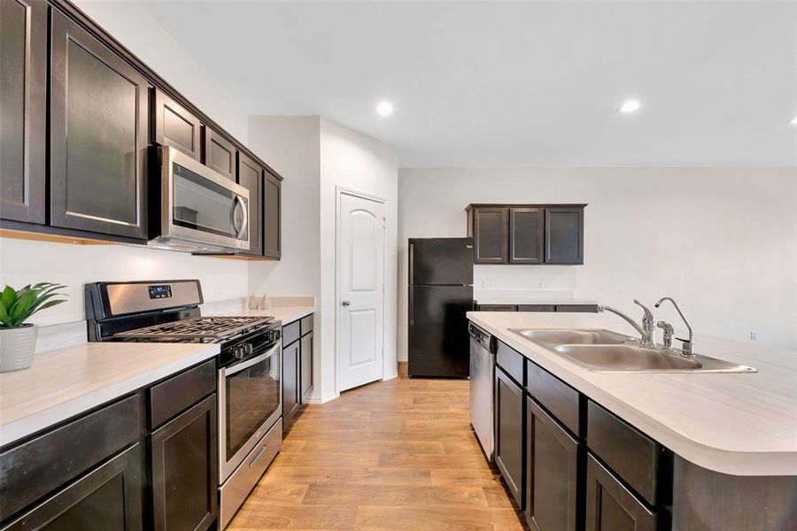 There is lots of storage in this kitchen for all your prepping, cooking and entertaining needs. A water purification system is in place for purified drinking water.