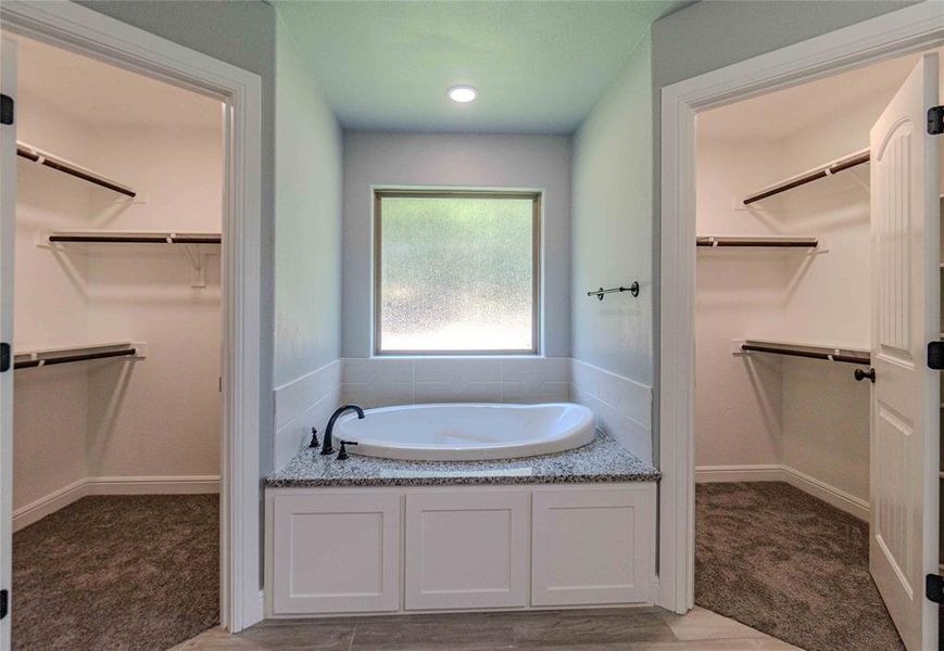 Bathroom with a bath to relax in