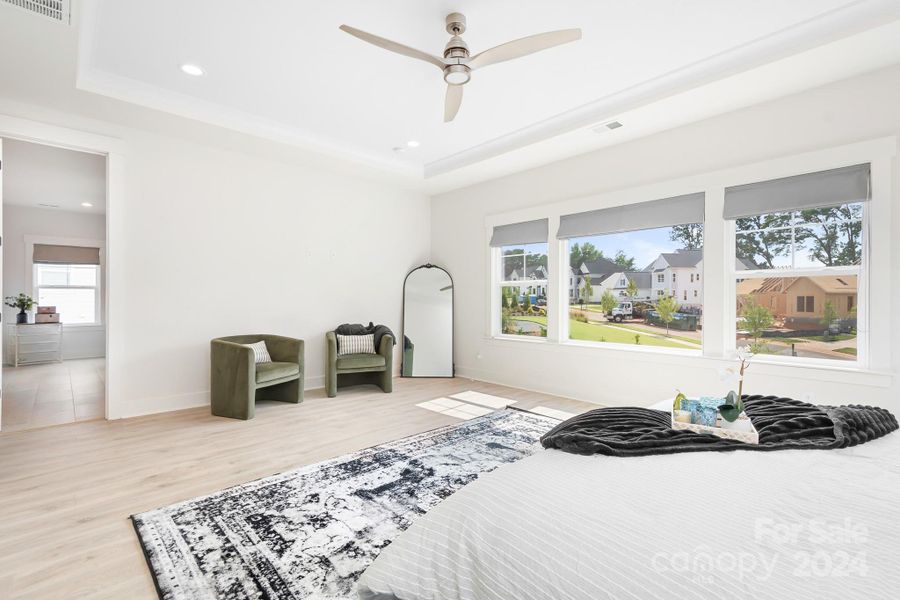 Primary bedroom has space for a sitting area, office or exercise area.