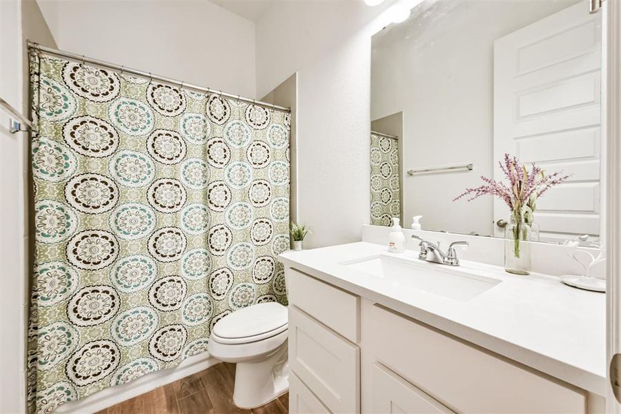 Third bathroom features atub/shower combo and vanitywith plenty of counter space.