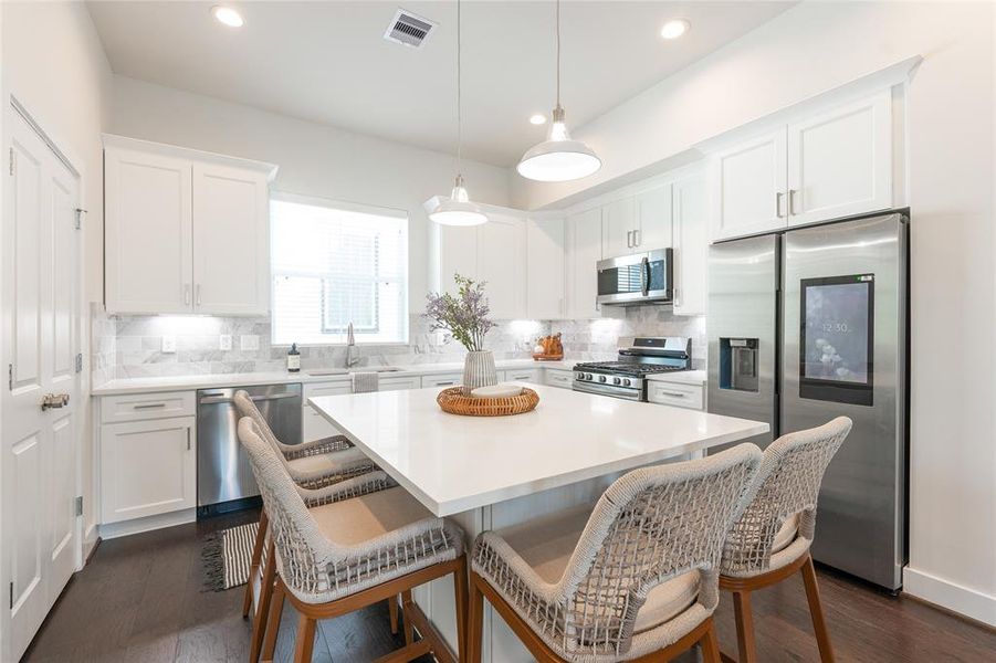 MODEL HOME WITH SIMILAR FINISHES - KITCHEN