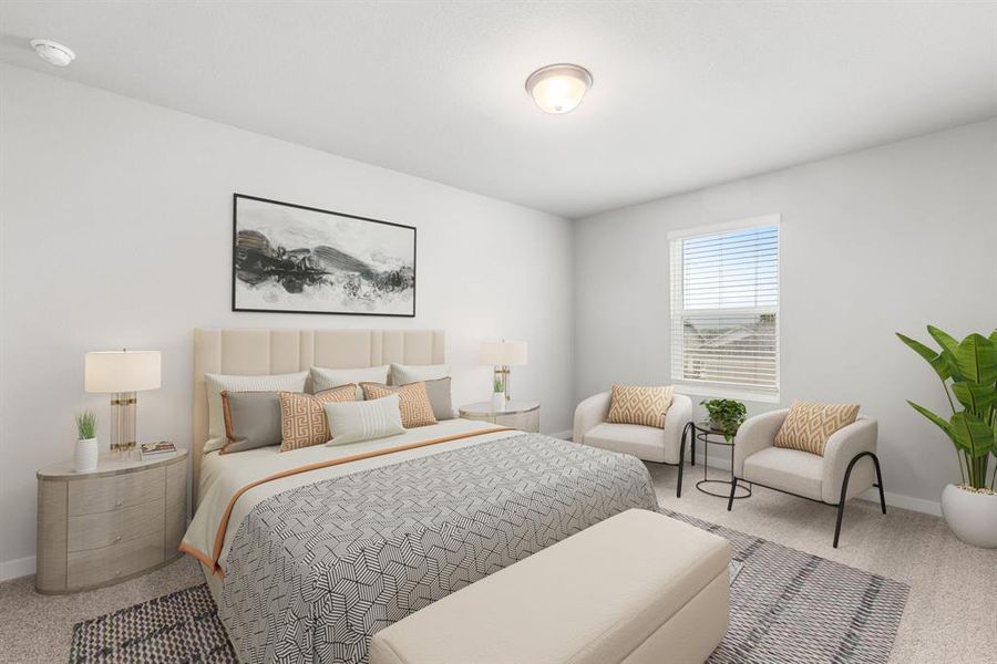 Secondary bedroom features plush carpet, neutral paint, large window and ample closet space.