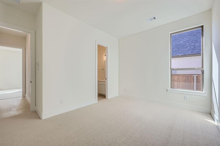 View of carpeted spare room