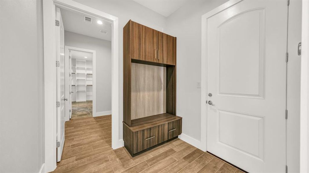 Unfurnished bedroom featuring ceiling fan and carpet flooring