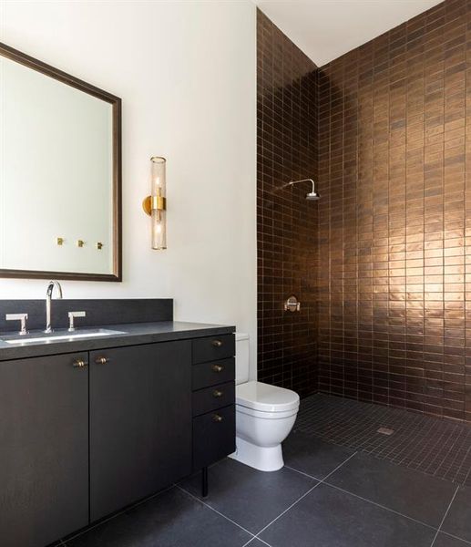 This bronze subway tile with luminous finish was sourced in New York City.