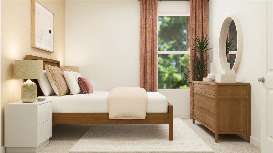 Bedroom featuring light colored carpet