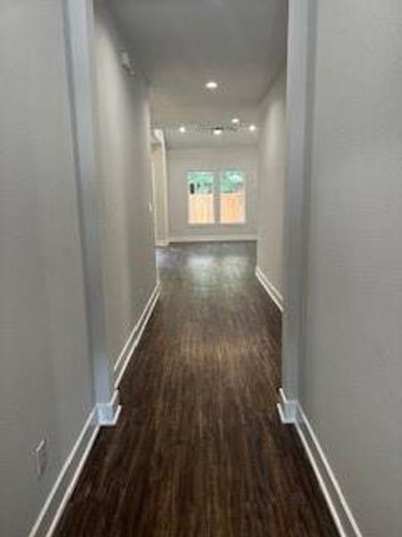 Extended Foyer with vinyl plank flooring