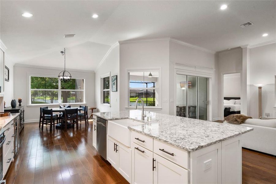 The Center Island is adorned with Cambria Quartz Countertop and Farmer Sink