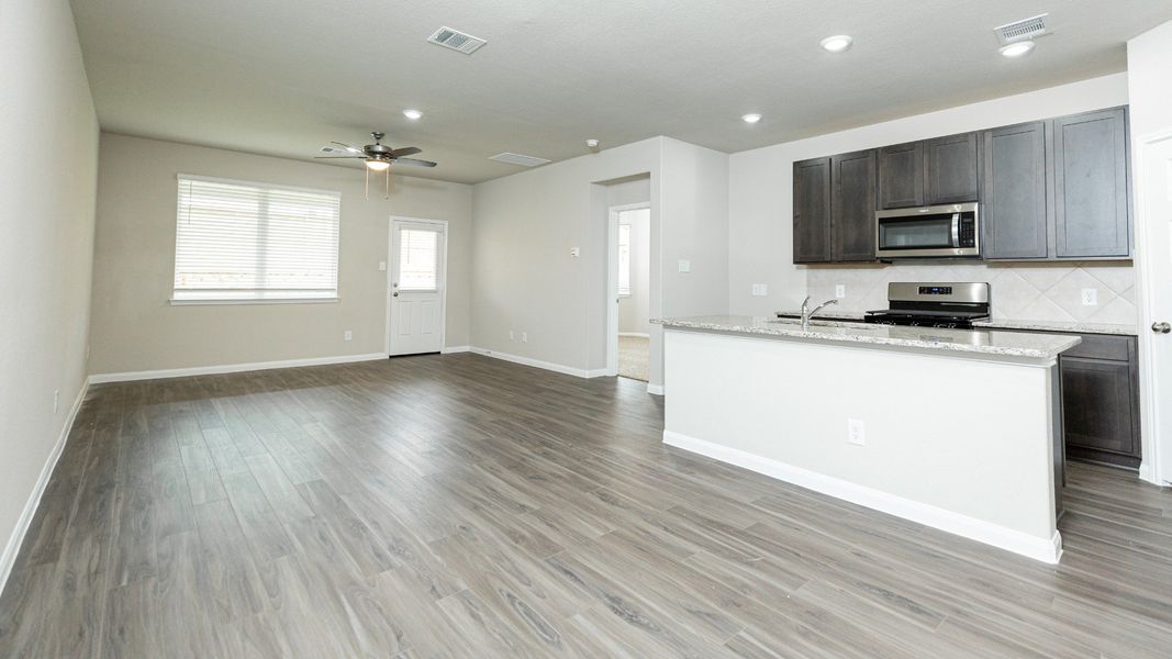 Dining Area to Kitchen and Family Room