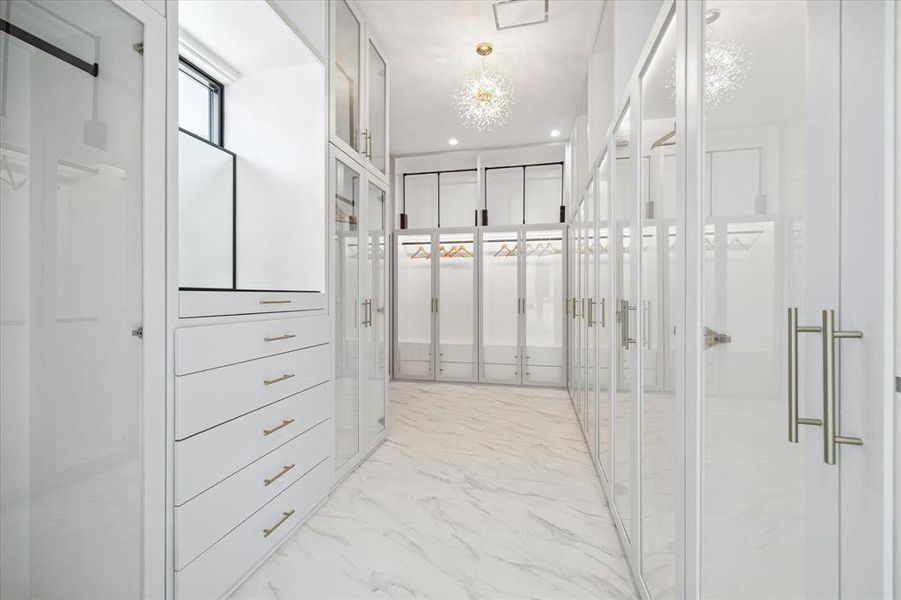 Fantastic fitted and LED lit walk-in closet, complement by a secondary Primary closet