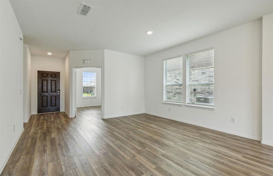 Spacious entry way with dining room*real home pictured