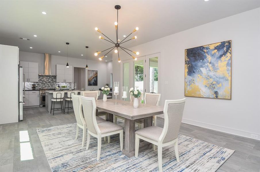 Dining room space with plenty of natural light with a wonderful view to the patio.