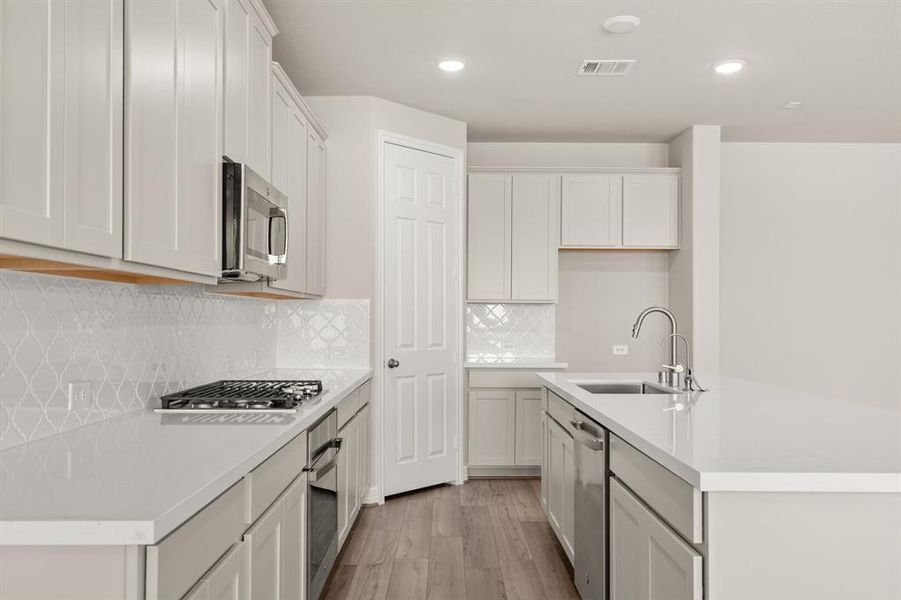 This kitchen is not only a functional space but also has ample storage. Whether you're a seasoned chef or just love to gather and enjoy good food, this kitchen is a dream come true.