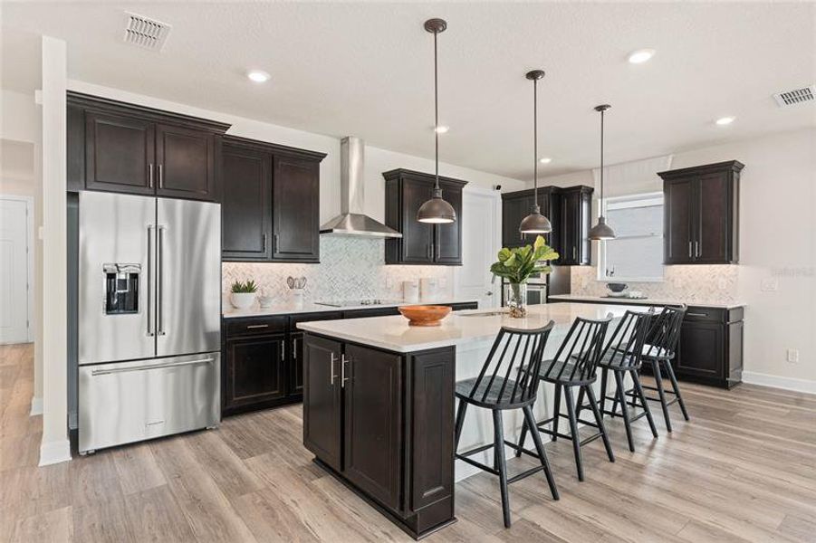 Kitchen. Model Home Design. Pictures are for illustrative purposes only. Elevations, colors and options may vary. Furniture is for model home staging only.