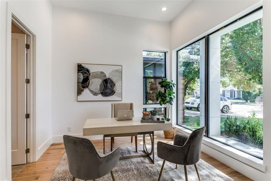 Office area featuring light hardwood / wood-style flooring