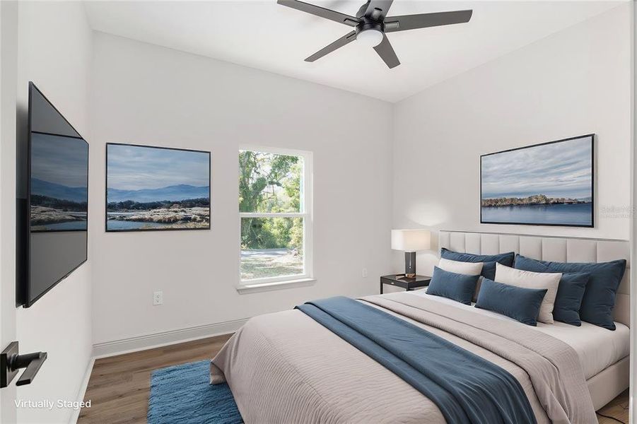 Bedroom #3 with Ceiling Fan, 9' Ceiling ,Large Closet and Luxury Vinyl Plank Flooring (Virtually Staged)