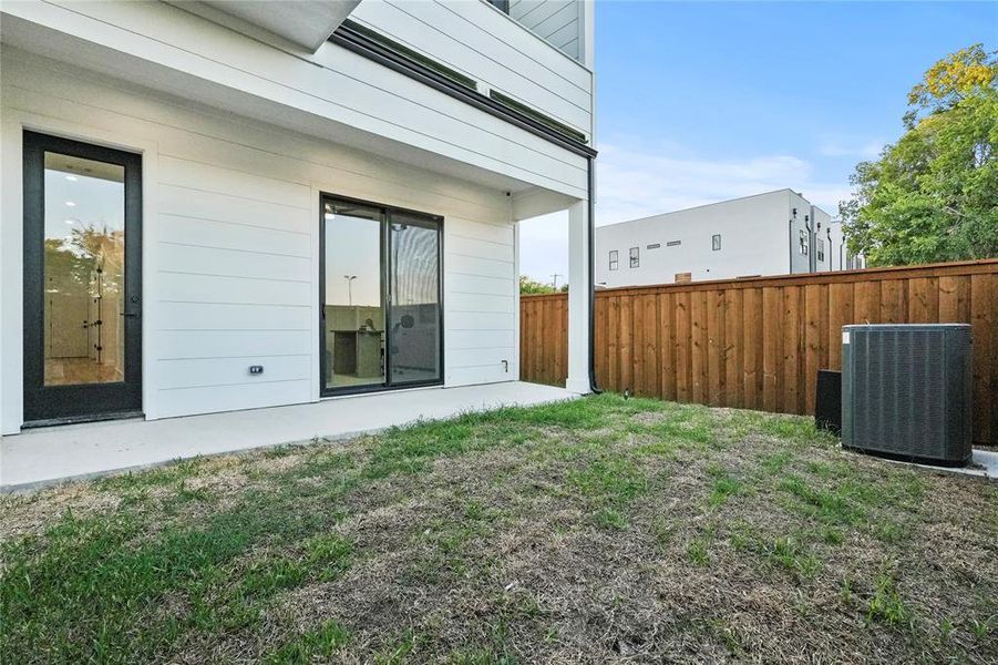 View of yard featuring a patio area and cooling unit