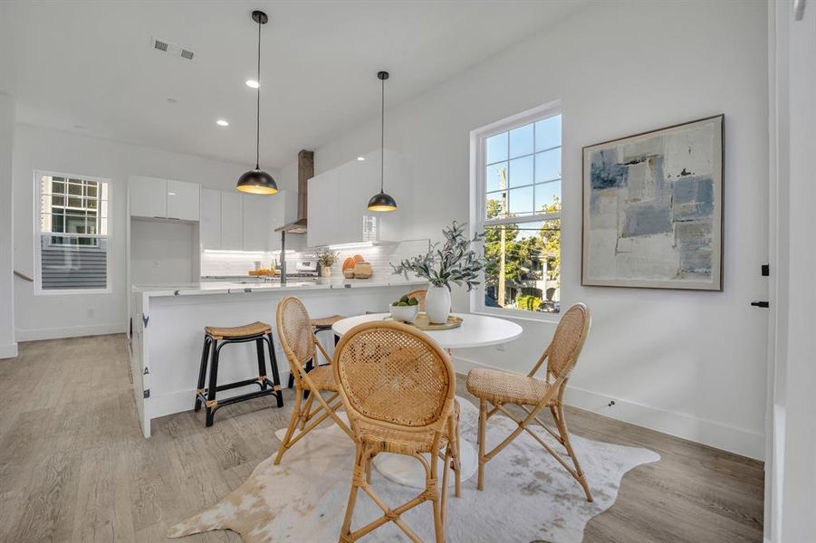 Dining room featuring light wood-type flooring