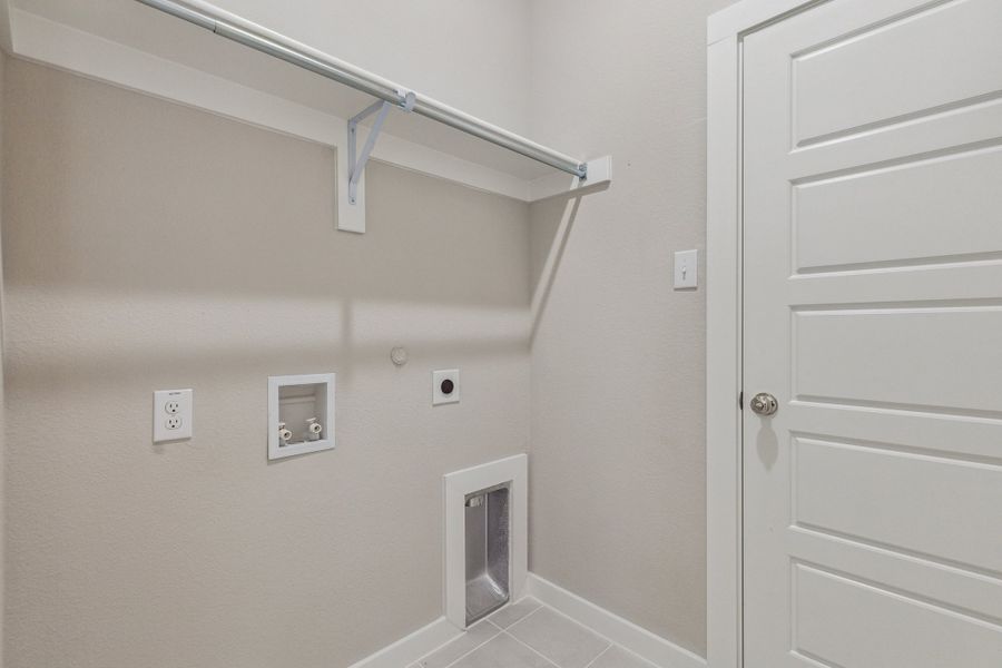 Utility Room in the Birch home plan by Trophy Signature Homes – REPRESENTATIVE PHOTO