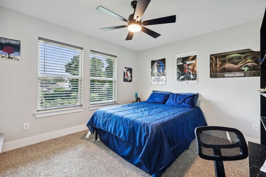 Bedroom with carpet floors and ceiling fan