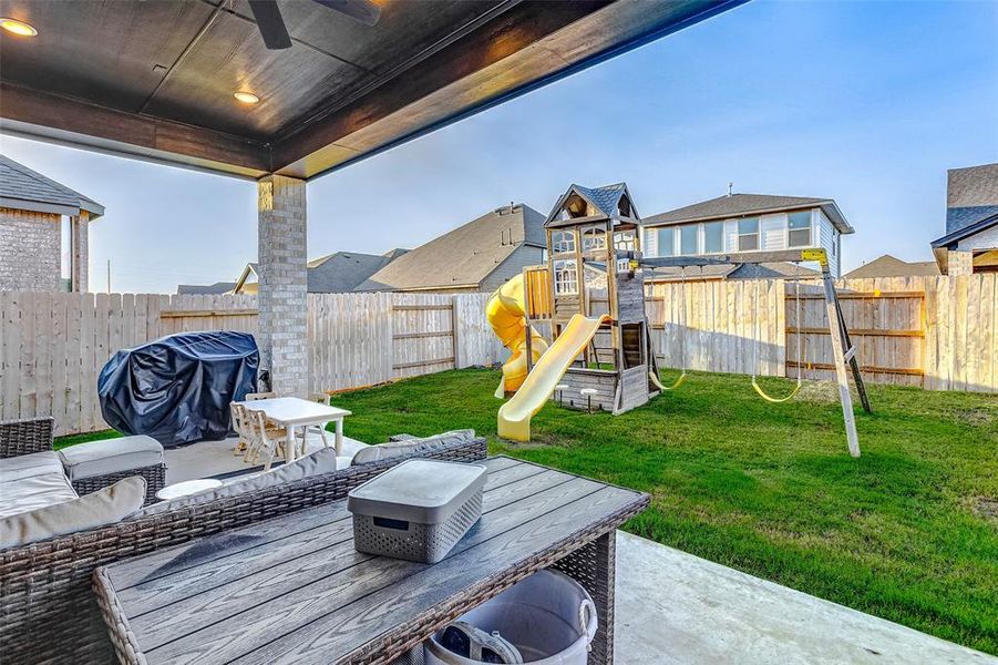 Enjoy cool evenings out on the extended covered patio while the family or pets play in the backyard.