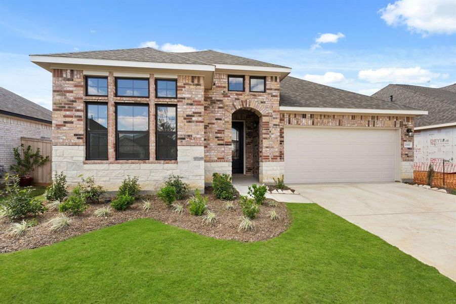 Welcome home to 21411 Blue Oak Drive located in the Oakwood Estates community zoned to Waller ISD.