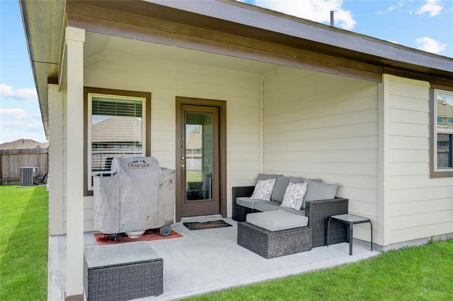 SPEND TIME AND HAVE FUN WITH YOUR FAMILY IN THIS BACK PATIO AND HUGE YARD.