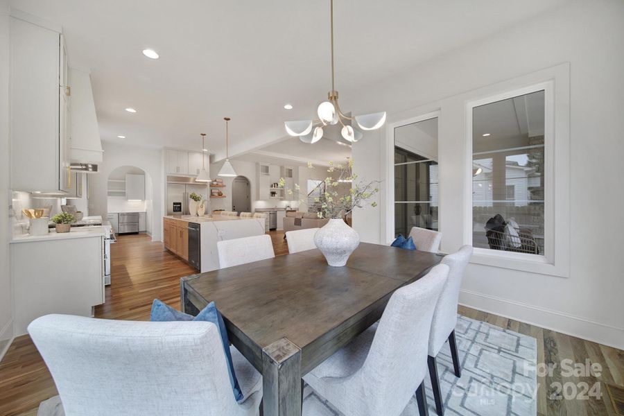 View from dining area to kitchen and living room.