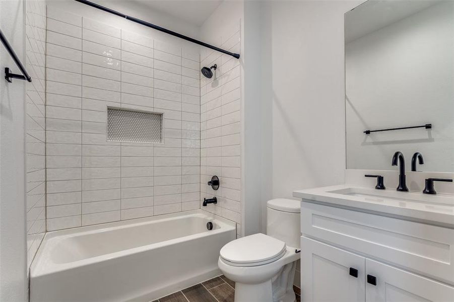 Full bathroom with subway tiles