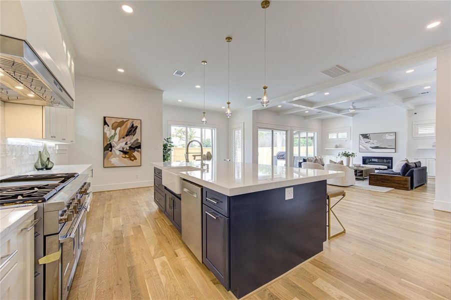 Very spacious kitchen with double spice racks with Beautiful Pendant lights