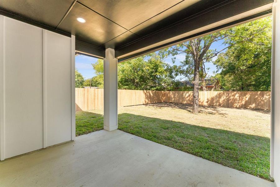 View of yard with a patio