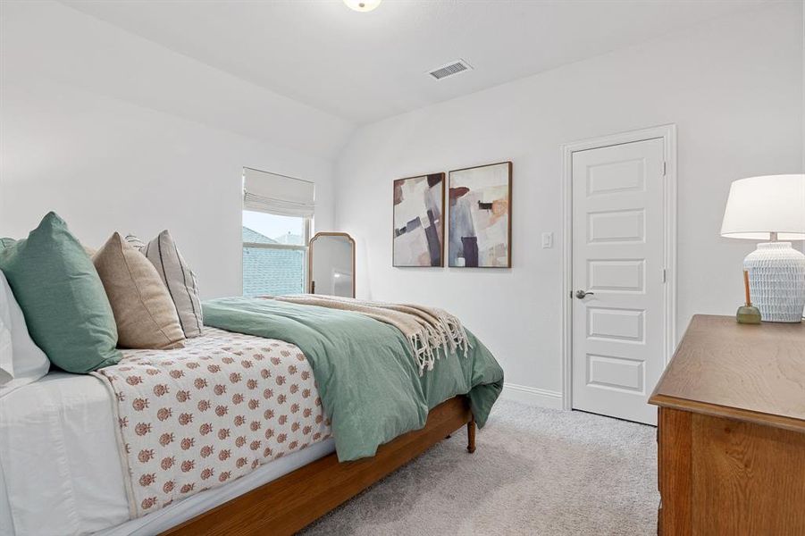 Bedroom featuring carpet floors