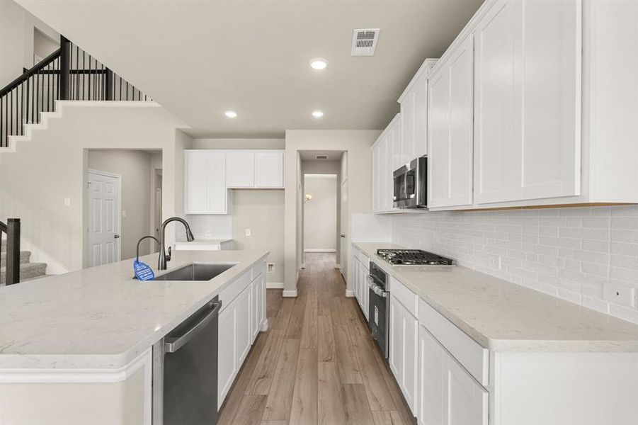 This kitchen is not only a functional space but also has ample storage. Whether you're a seasoned chef or just love to gather and enjoy good food, this kitchen is a dream come true.