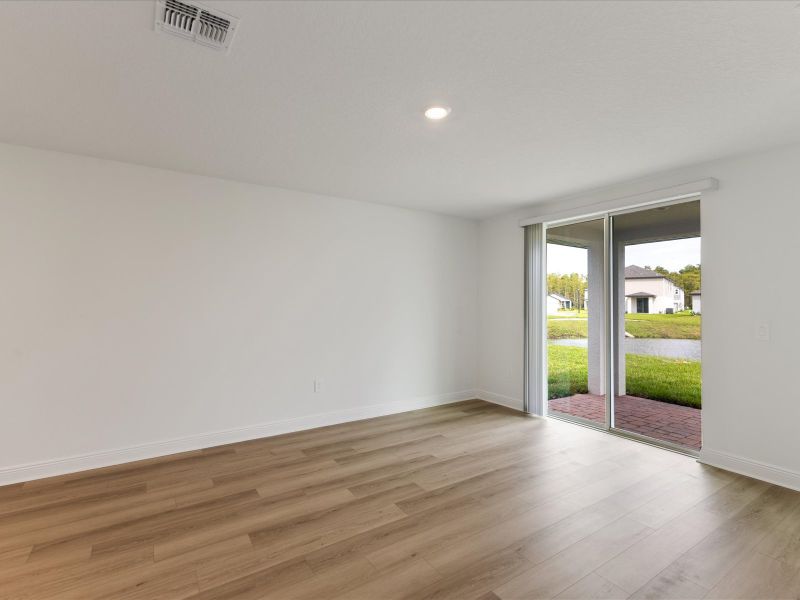 Living room in the Everglade floorplan at 209 Links Terrace Blvd