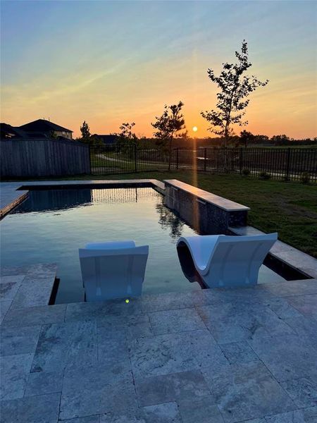 As we leave you with another shot taken of one of the iridescent sunsets that await you at this wonderful home, we want to encourage you not to let the sun set on your opportunity to own this home, make your appointment today!