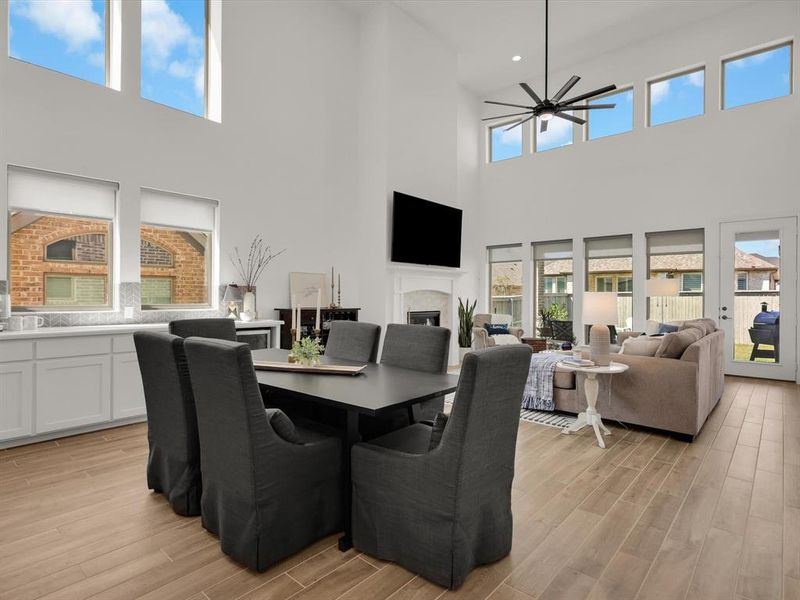 The dining area seamlessly connects the kitchen and living spaces.